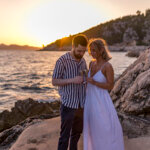 Couple embracing by the sea Arboretum Trsteno Dubrovnik